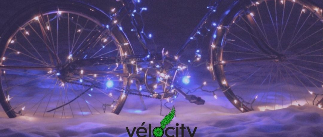 December 5 As-is Bike Sale, bike wrapped in Christmas lights